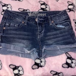 Medium wash blue shorts with a cuff